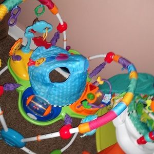 BABY EINSTEIN MUSICAL MOTION ACTIVITY JUMPER, BLUE